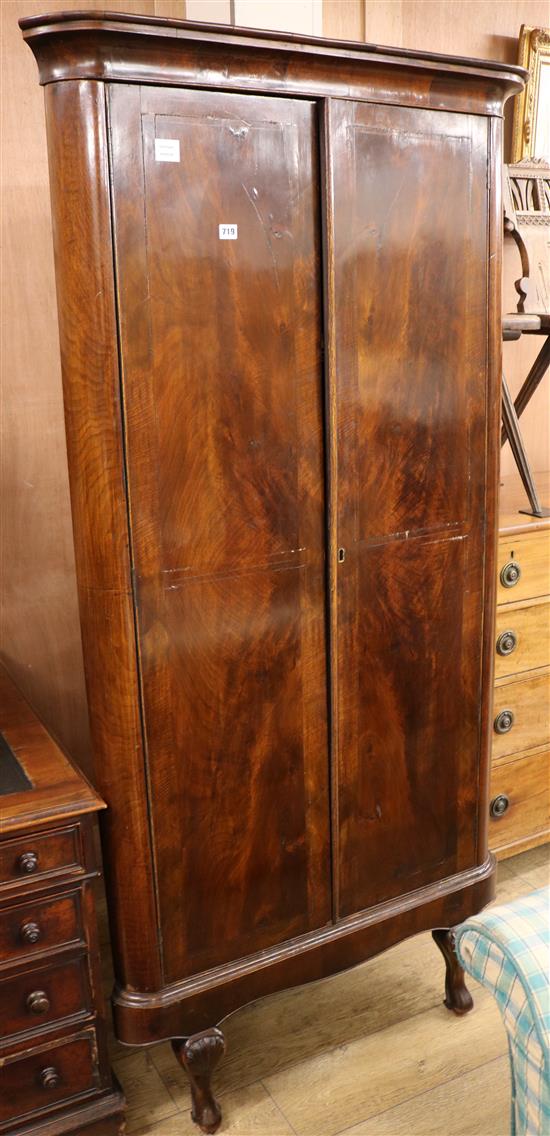 An early 19th century Biedermeier mahogany standing corner cupboard W.95cm